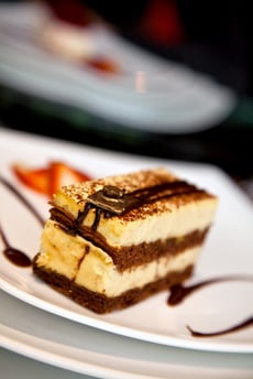 Delicious chocolate dessert served on a white plate